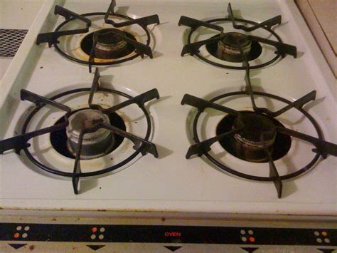 roper gas stove clicking